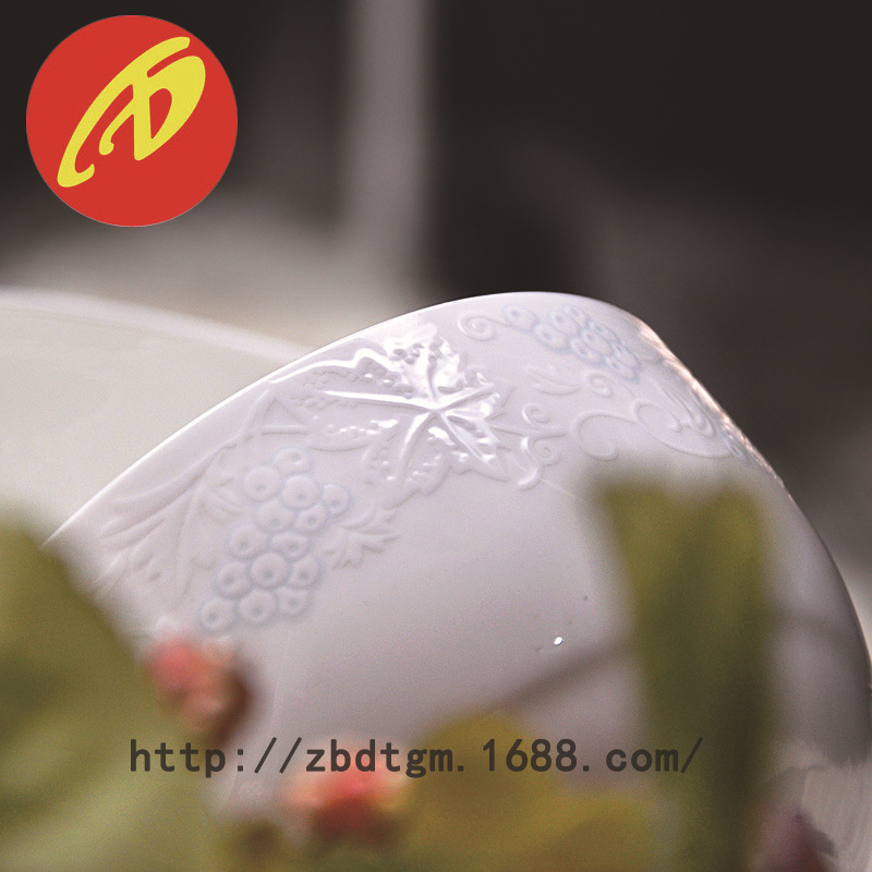 厂家直销釉上彩50头浮雕创意骨瓷餐具套装 商务陶瓷餐具碗碟1