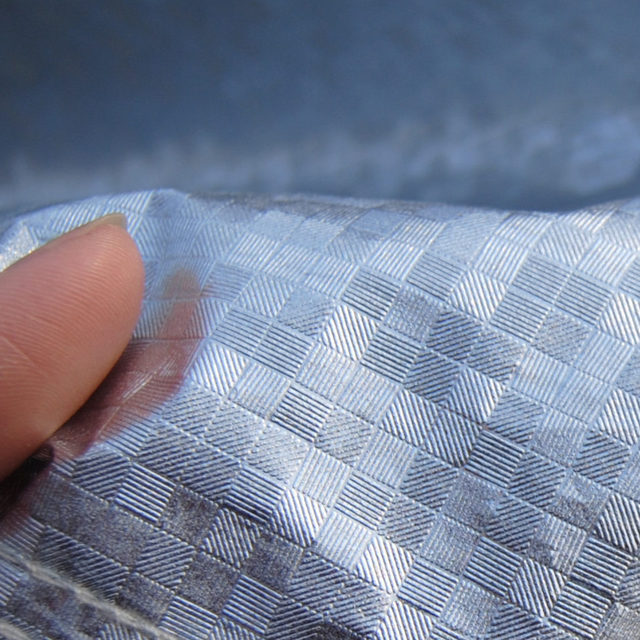 工厂直供可定制多种车衣布料3D立体方格铝膜防水防晒电动车车衣4