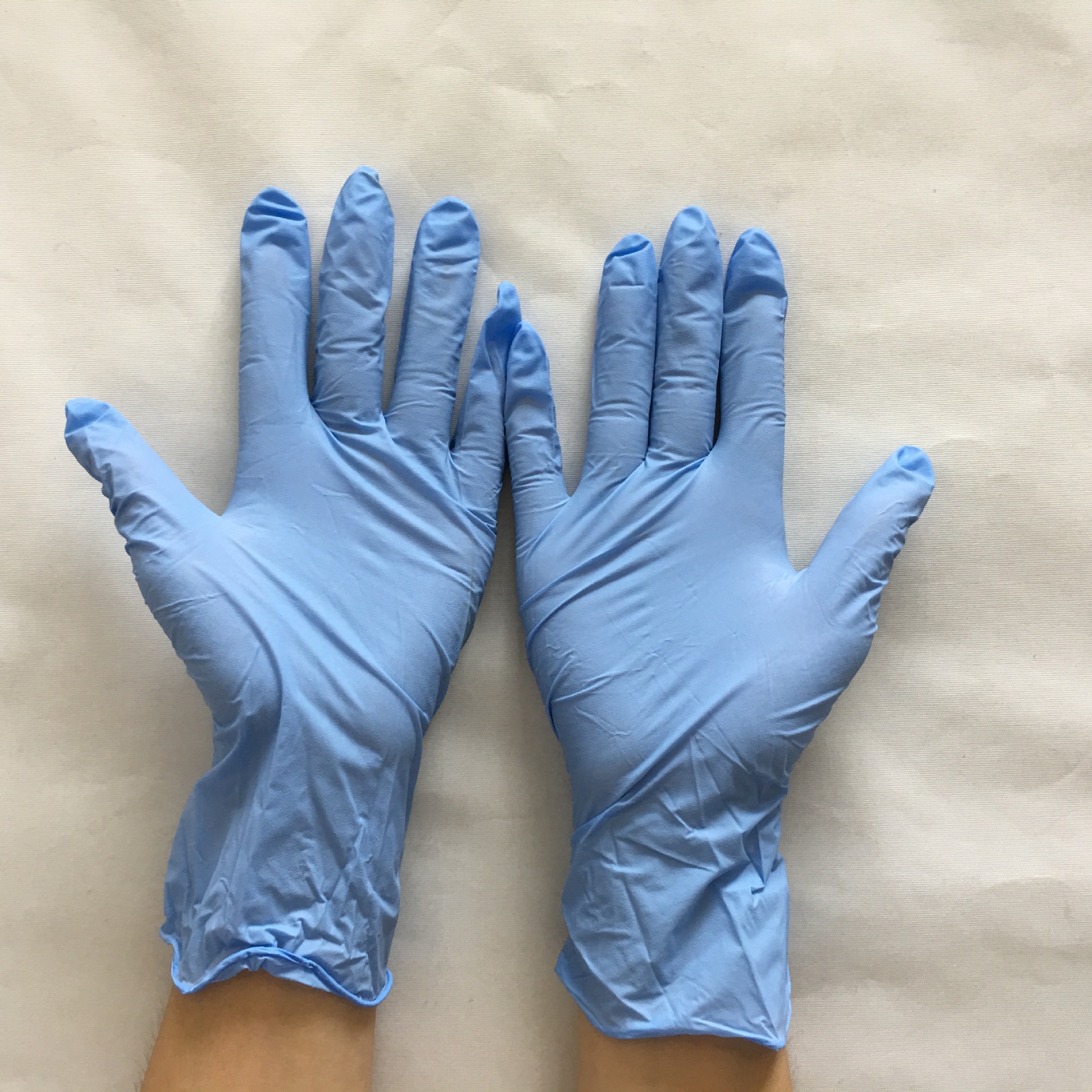 厂家批发包邮9寸无粉耐磨丁晴手套 蓝色防滑防油防静电实验室手套
