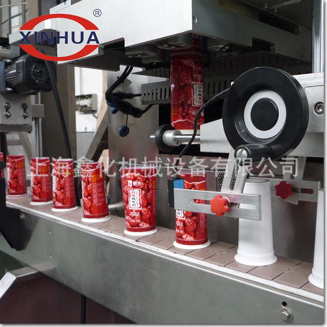 上海厂家直销大瓶全自动套标机自动套标收缩包装机标签自动收缩包1