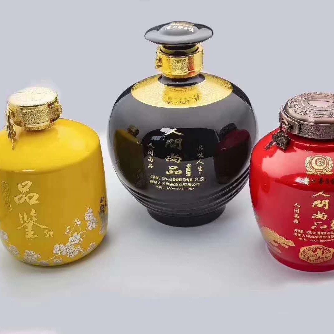 郓城县金达酒类包装有限公司专业生产各种彩色喷涂烤花玻璃瓶